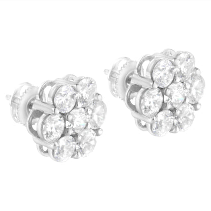 Close-up front angle of white metal stud earrings featuring clusters of round white gemstones in shared prong settings.