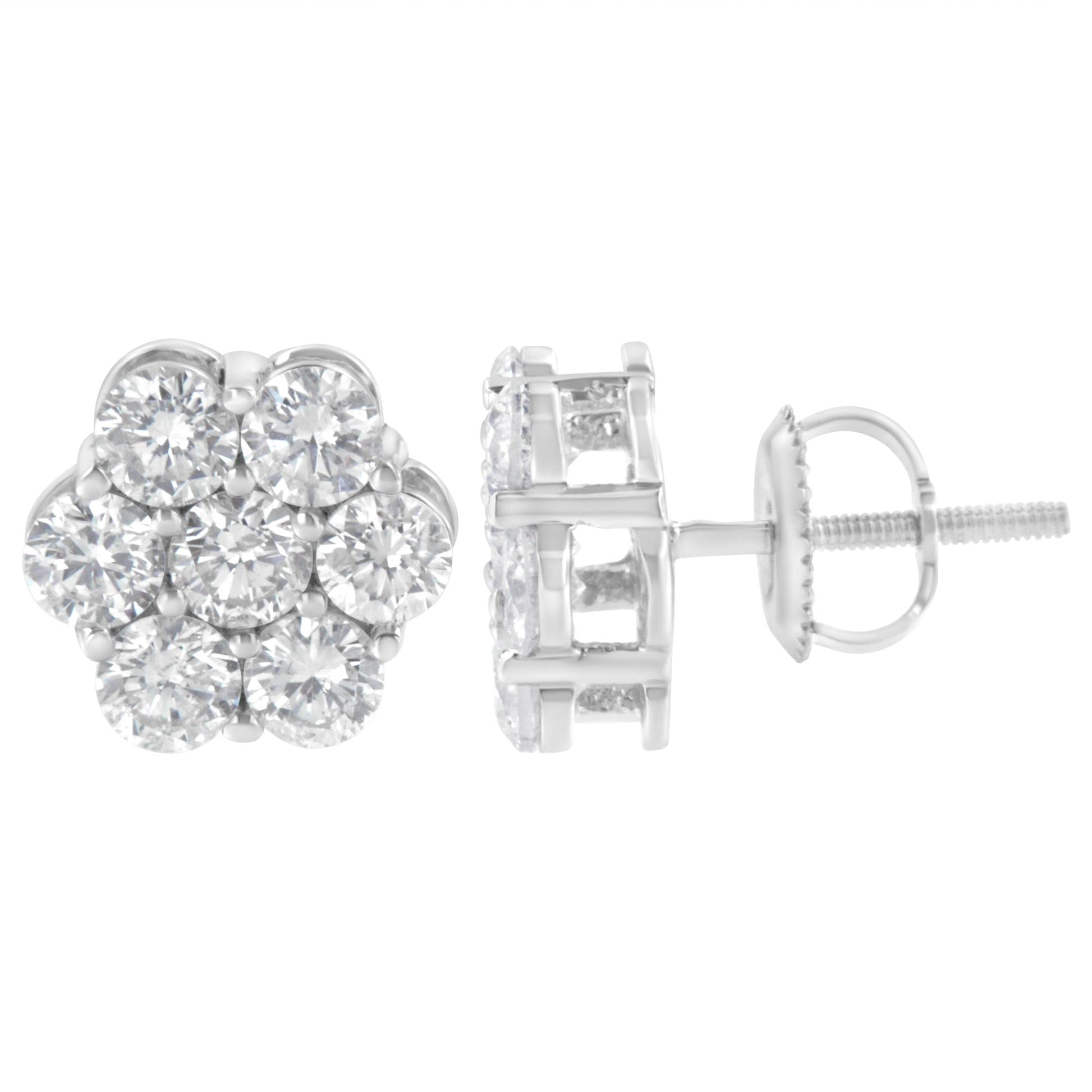 Pair of white metal stud earrings with round white gemstones set in a cluster, shown from front and side angles.