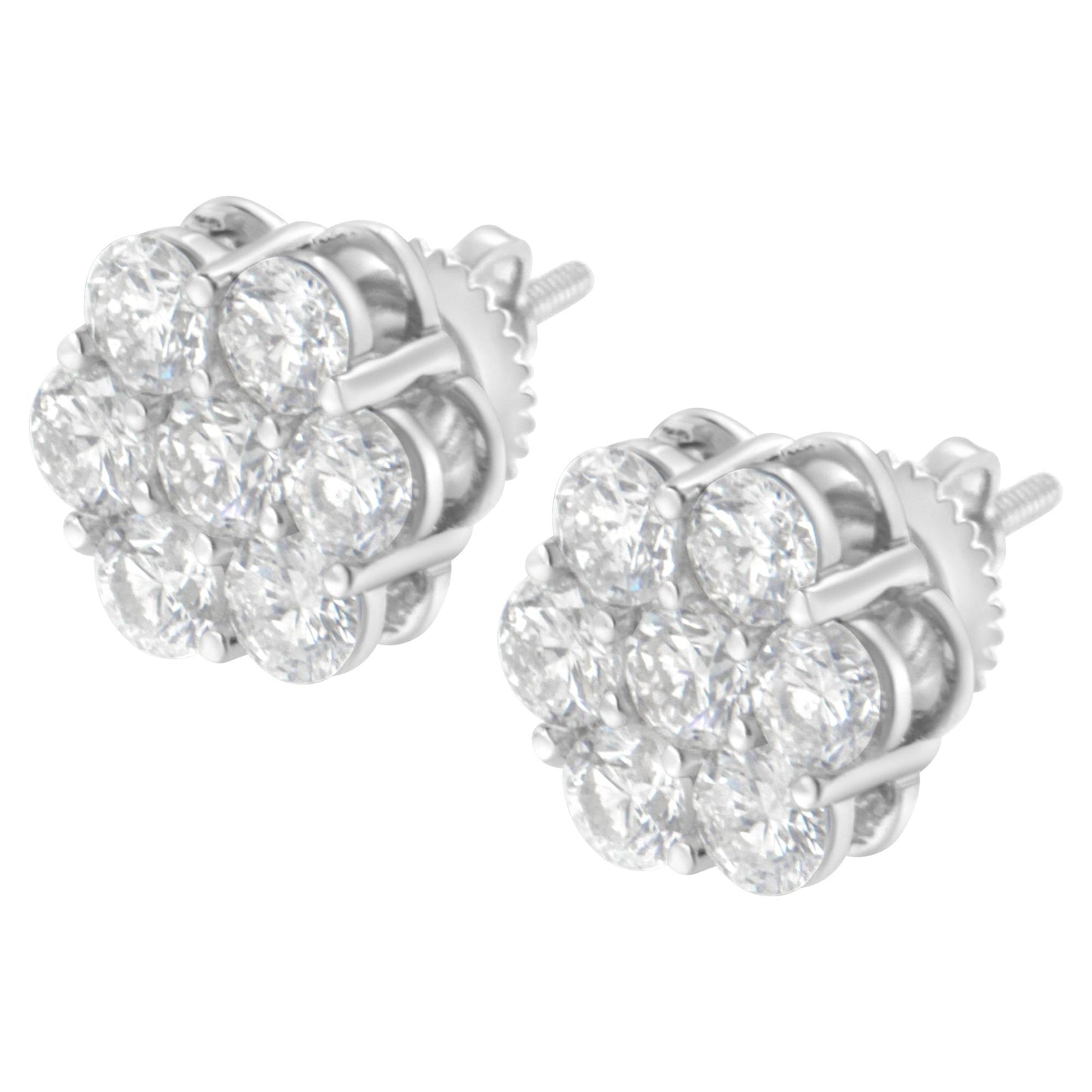 Pair of white metal stud earrings with multiple round white gemstones in prong settings, shown from a front angle.