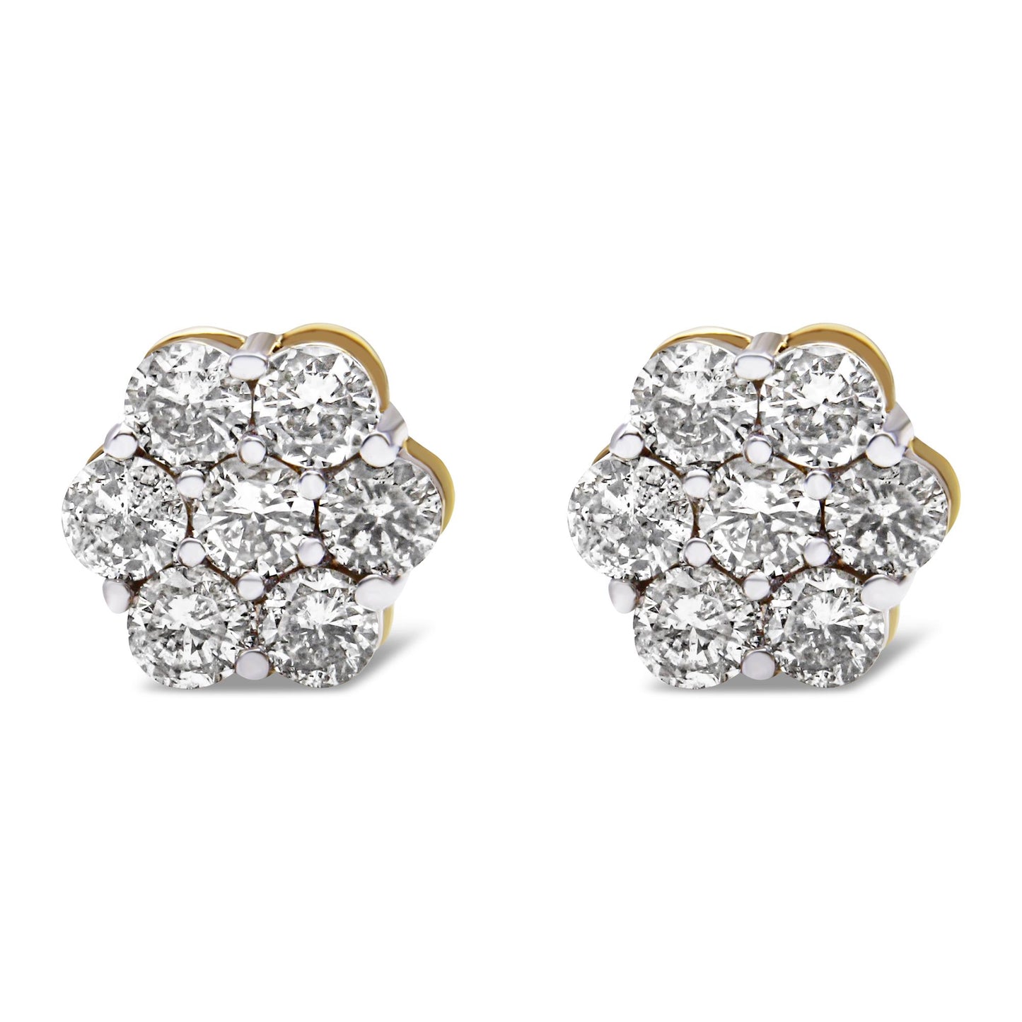 Front angle view of pair of yellow metal flower-shaped earrings with white round gemstones in prong settings.