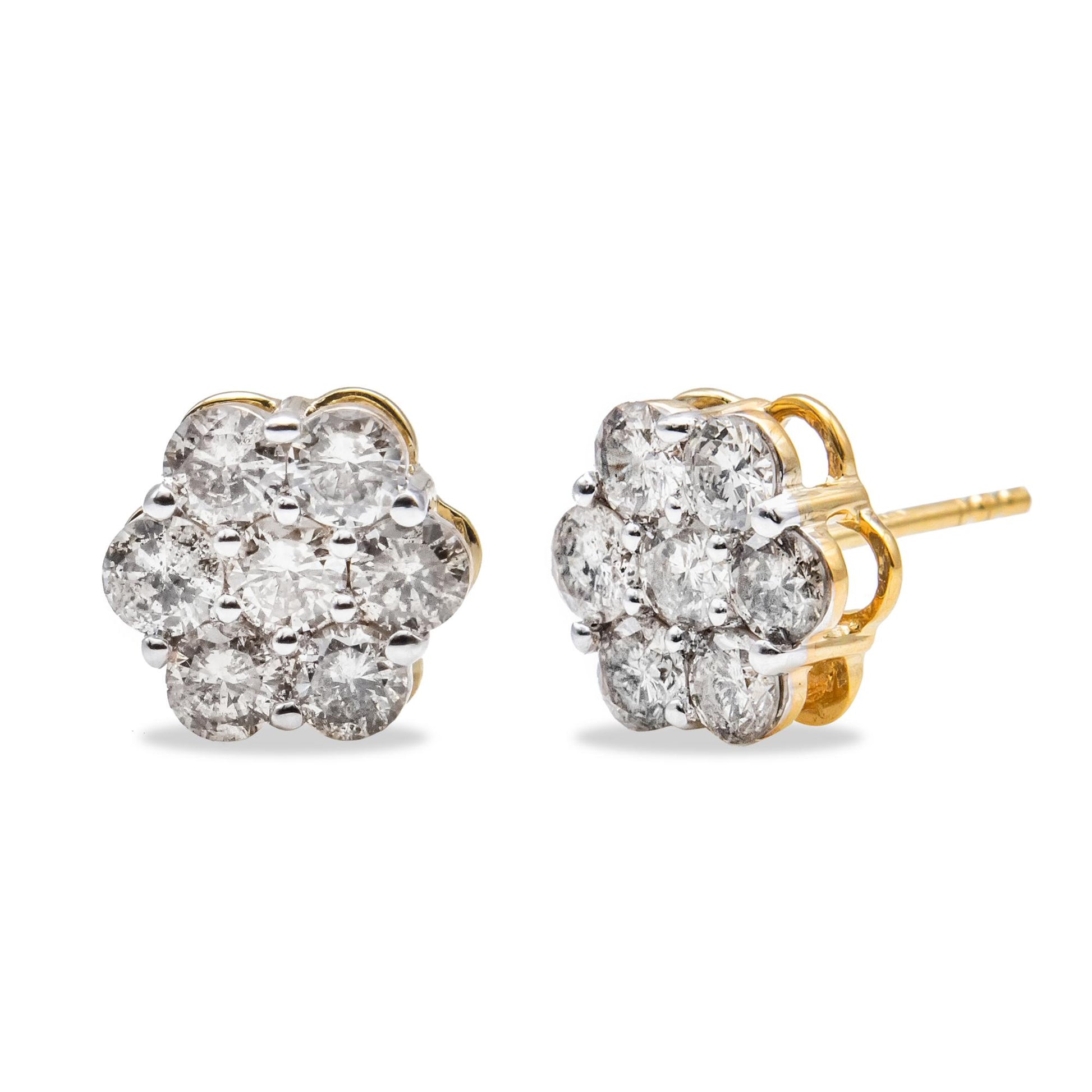 Pair of yellow metal stud earrings with round white gemstones set in a flower shape, shown from a front and side angle on a white background.