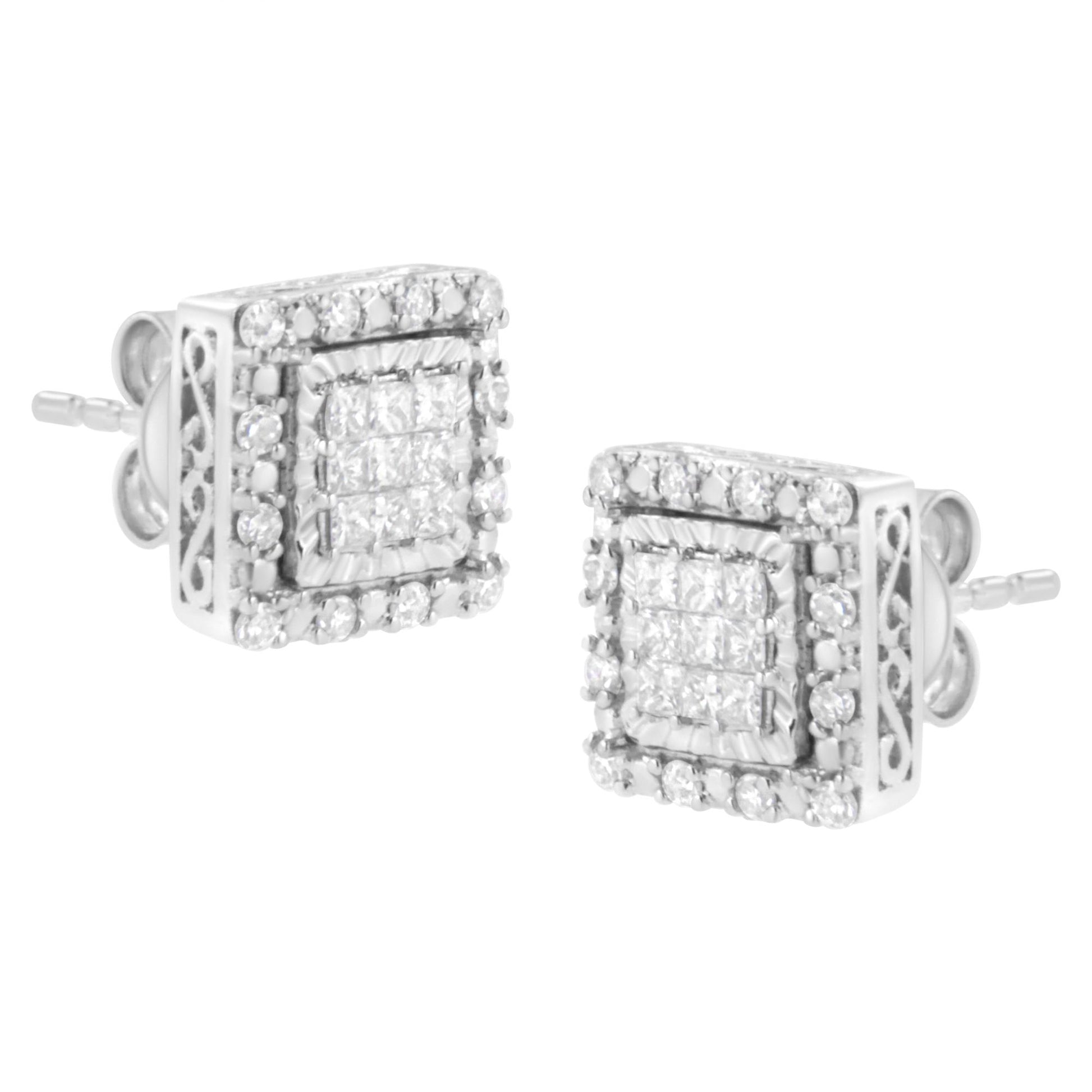 Pair of white metal square stud earrings with princess and round white gemstones, shown from a diagonal front angle.