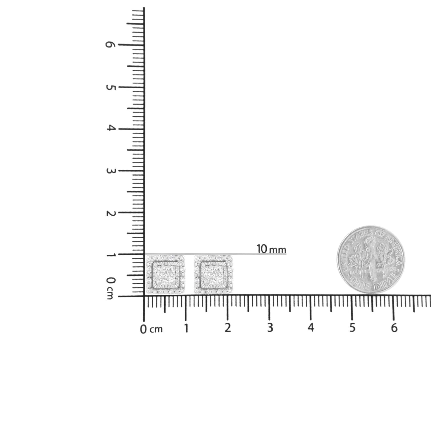 Top-down view of a pair of square white metal earrings with central invisible-set princess shape white gemstones surrounded by round pave-set white gemstones, placed on a ruler for size reference.