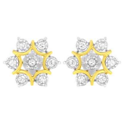 Front-facing view of a pair of yellow metal earrings with a star-shaped design featuring round white gemstones in a miracle setting.