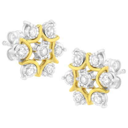 Close-up front angle of yellow metal stud earrings featuring a floral design with round white gemstones in a miracle setting.