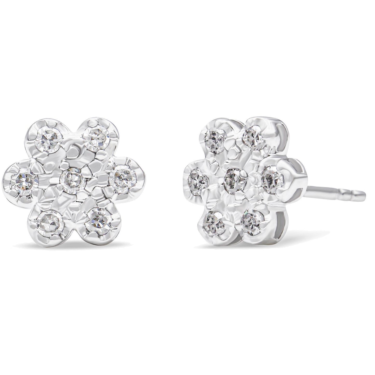 Front and side angled view of white metal flower-shaped stud earrings with round white gemstones in prong settings.