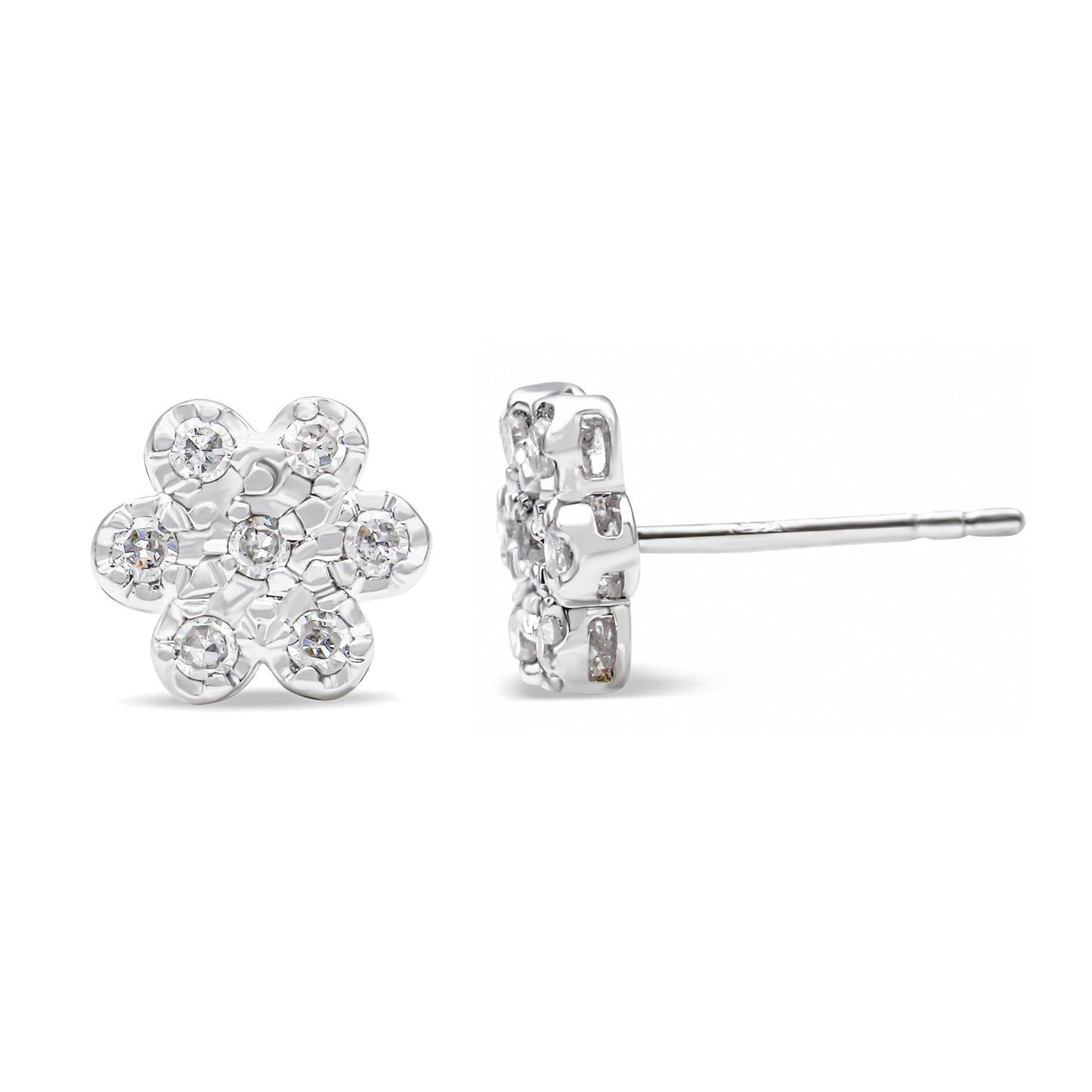 Pair of white metal flower-shaped stud earrings with round white gemstones in prong settings, shown from front and side angles.