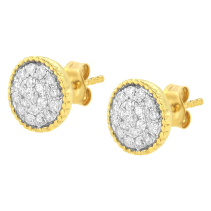 Pair of round stud earrings with white gemstones in prong settings surrounded by yellow metal border, shown from a front angled view.