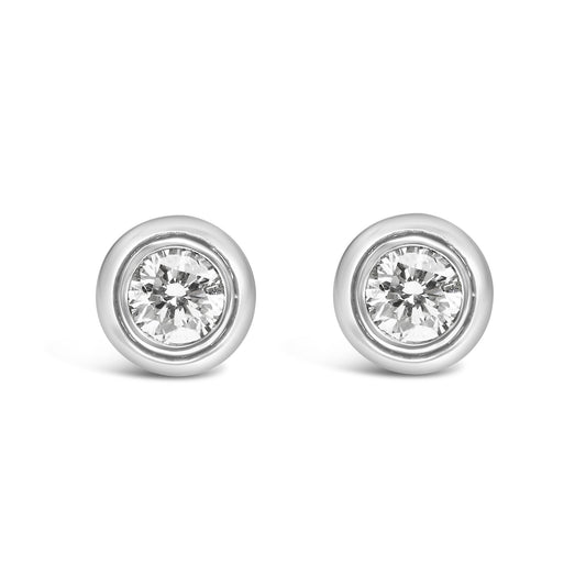 Front view of white metal round bezel-set earrings with white gemstones.