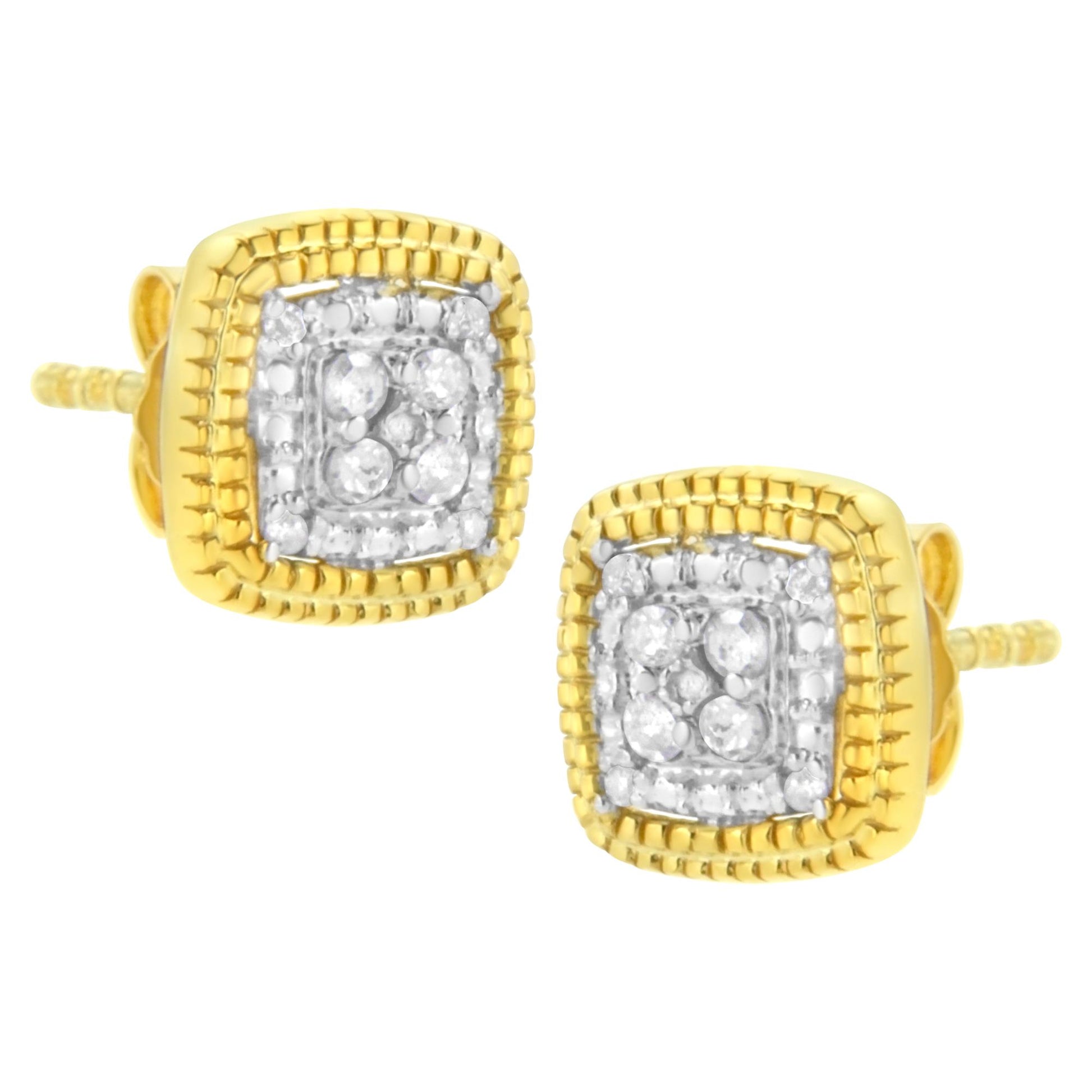 Pair of square yellow and white metal stud earrings with round white gemstones set in prong settings, shown from an angled front view.