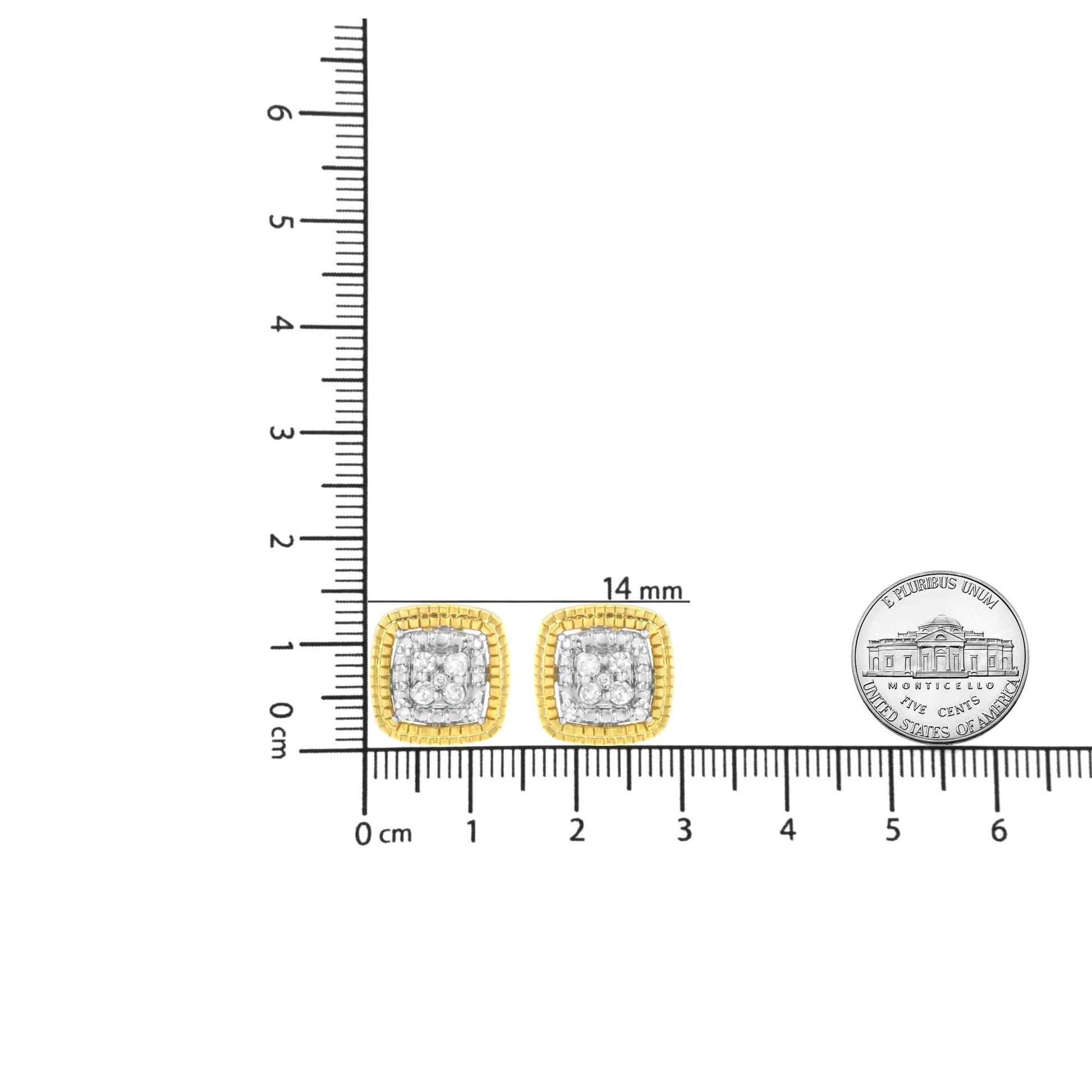 Pair of square-shaped earrings with yellow and white metal and multiple round white gemstones in prong settings, photographed from the front on a ruler for size reference.