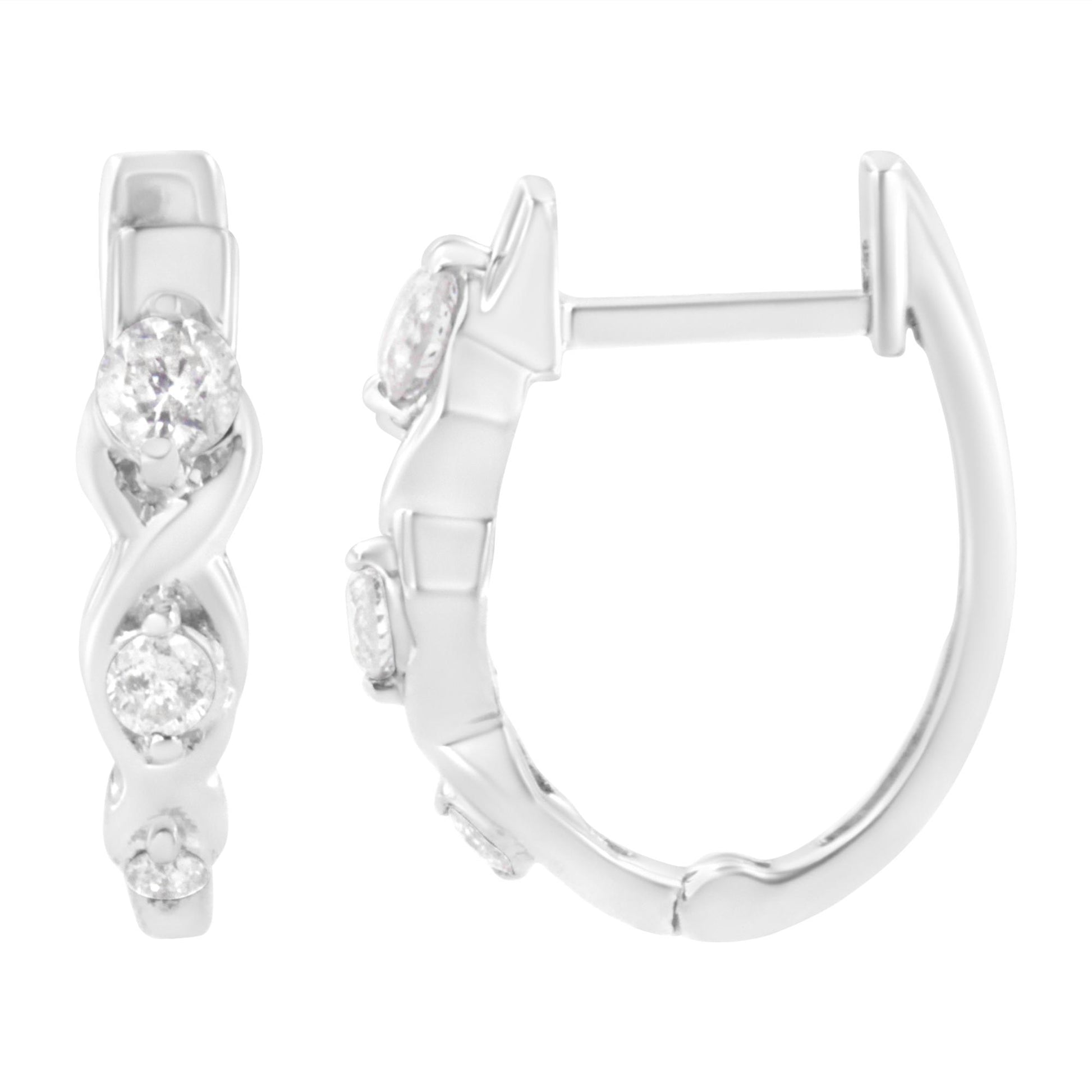Close-up front and side views of white metal hoop earrings featuring round prong-set white gemstones in a twisted design.