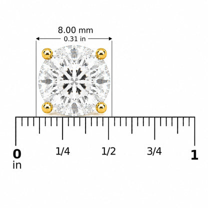 Close-up of a round white gemstone earring with a 4-prong yellow setting shown on a scale.