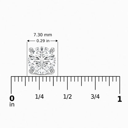 Close-up image of a round-shaped white gemstone earring with a four-prong setting in white metal, shown on a measuring scale from the front angle.