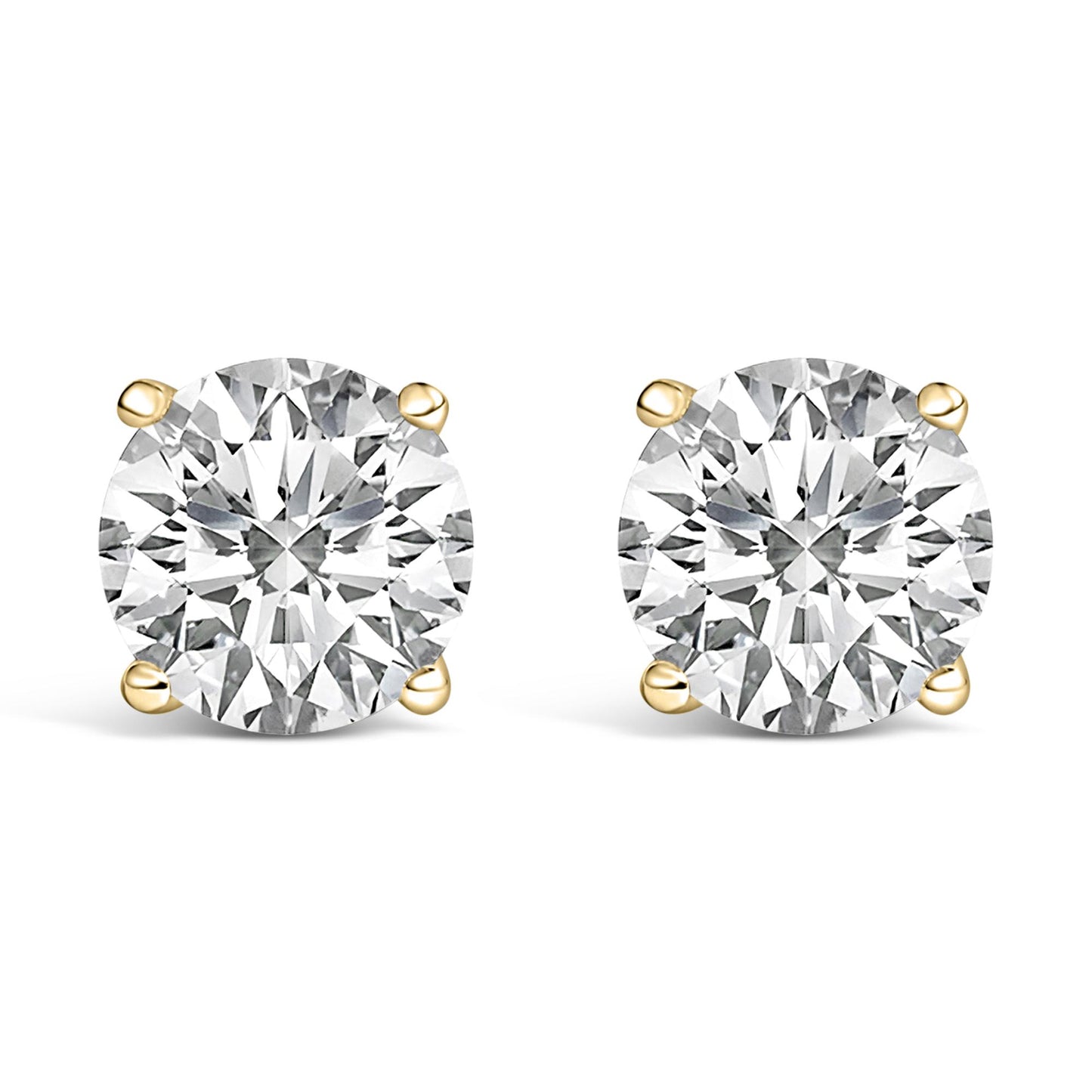 Front view of yellow metal stud earrings, each featuring a round white gemstone in a four-prong setting, shown against a white background.