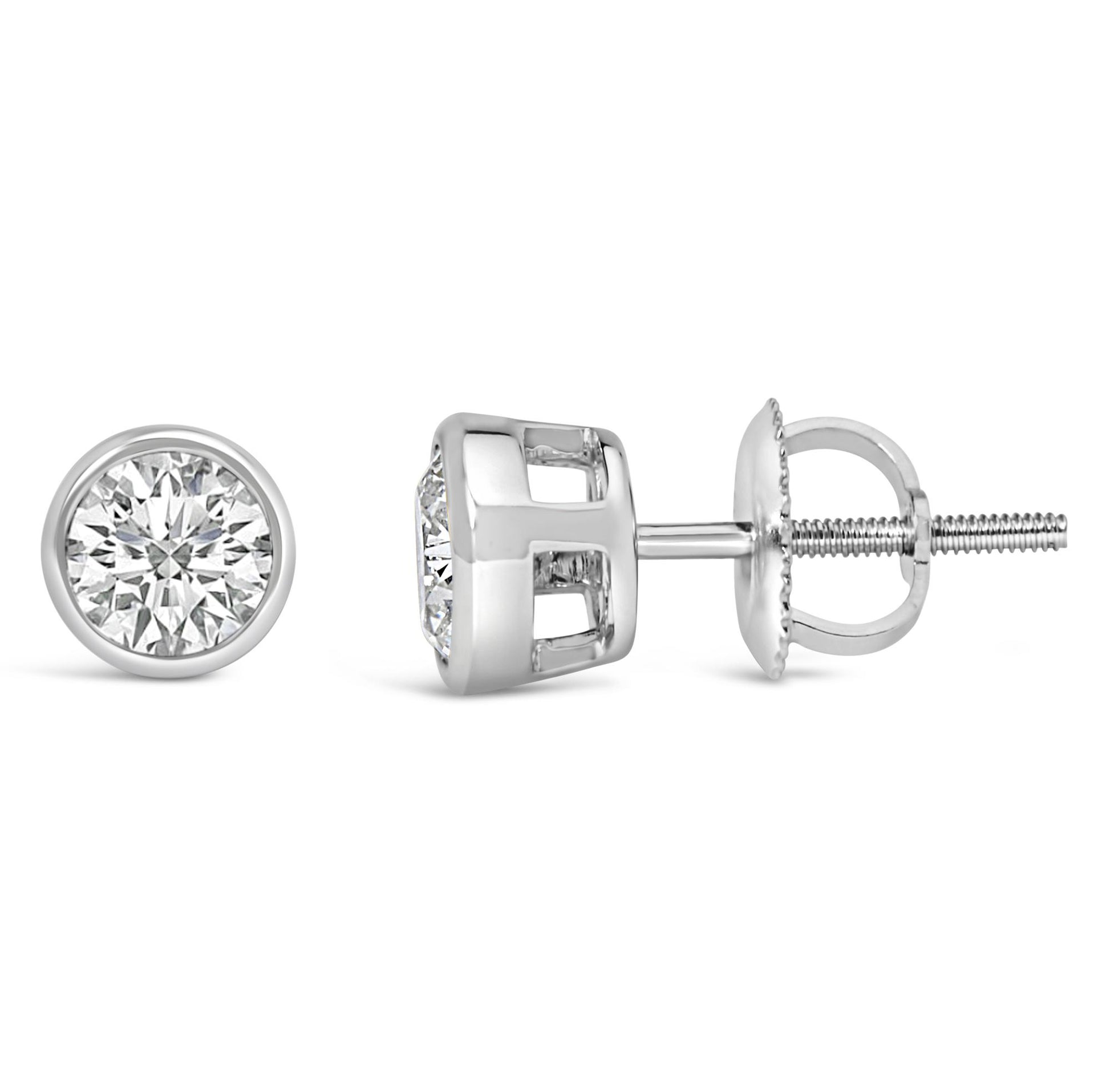 Front and side views of a pair of white metal stud earrings with round white gemstones in bezel settings on a white background.