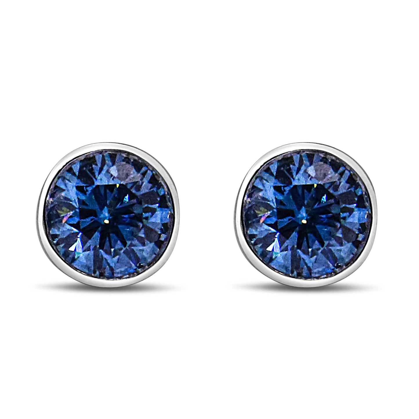 Front view of white metal stud earrings with round blue gemstones in bezel settings.