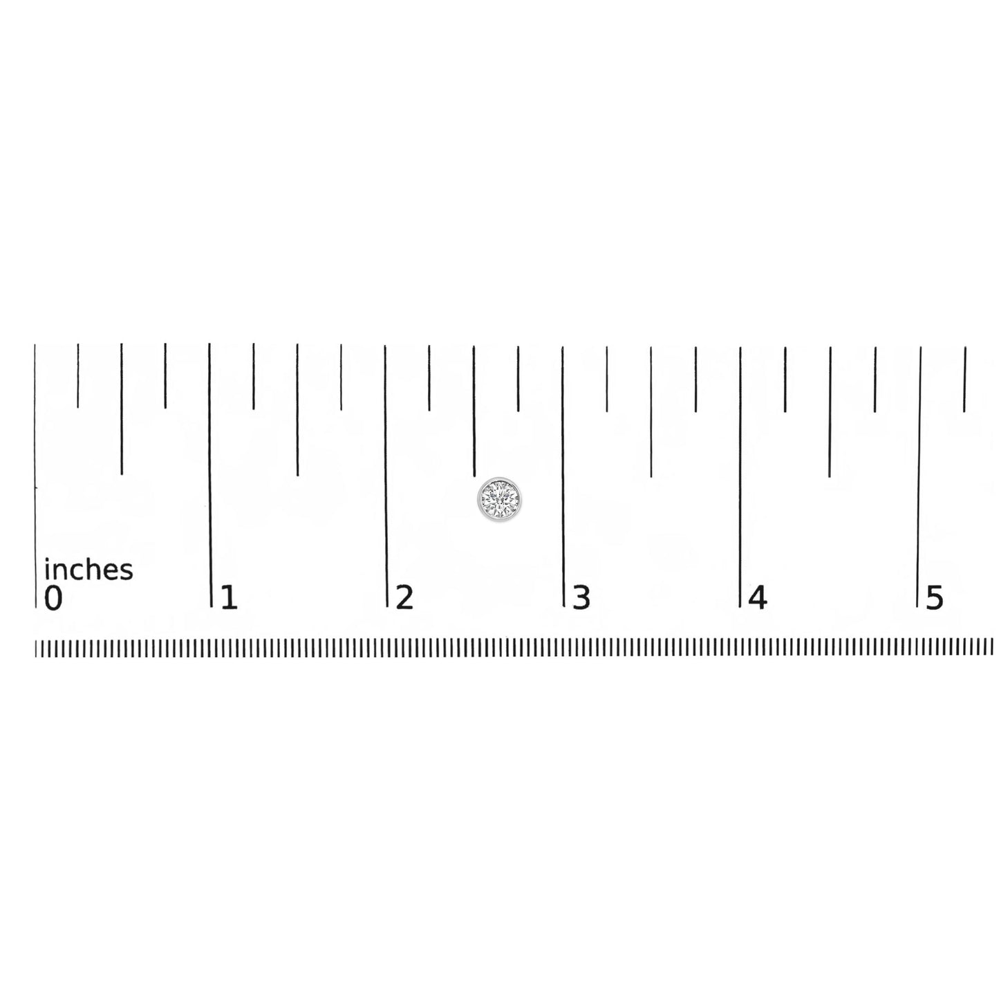 Close-up angled shot of a single white metal earring with a round white gemstone in bezel setting, shown on a ruler for size reference.