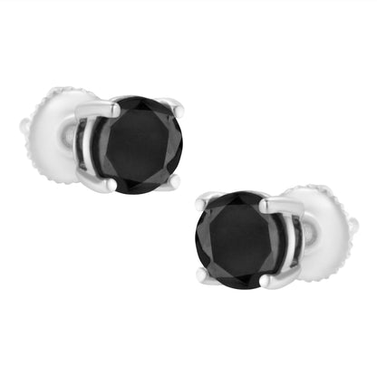 Pair of white metal stud earrings with round black gemstones in prong settings, shown in a close-up front angle.