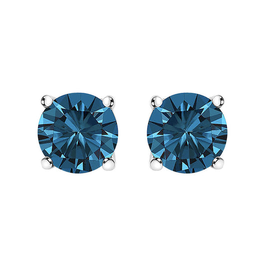 Front view of white metal stud earrings with round blue gemstones in four-prong settings.