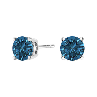 Pair of white metal stud earrings with round blue gemstones in four-prong settings, shown in a front and angled view on a white background.