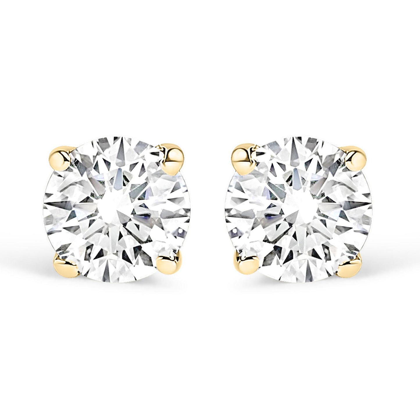 Front view of a pair of yellow metal stud earrings each set with a round white gemstone in a four-prong setting on a white background.