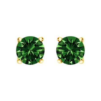 Close-up front view of a pair of yellow metal stud earrings with round green gemstones set in four-prong settings.
