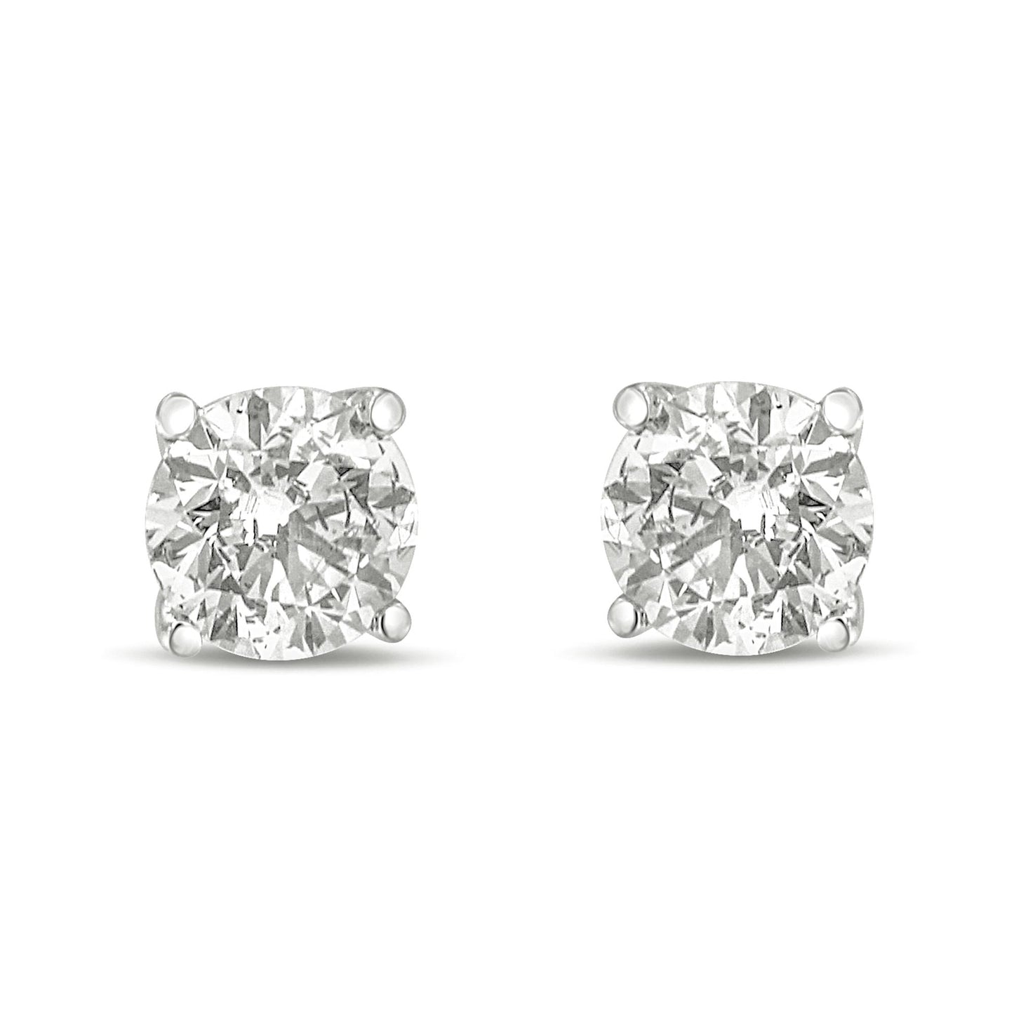 Front view of white metal round gemstone stud earrings with four-prong settings.