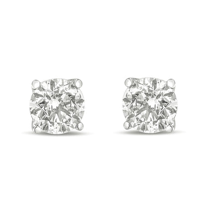 Front view of white metal round gemstone stud earrings with four-prong settings.