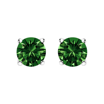 Front view of white metal stud earrings with round green gemstones set in four-prong settings.
