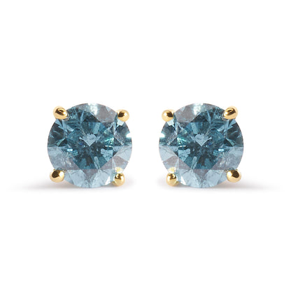 Front-facing view of yellow metal stud earrings with round aqua blue gemstones in 4-prong settings.