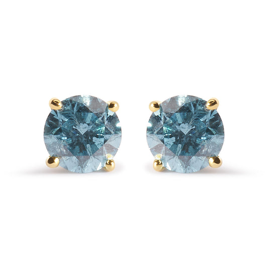 Front-facing view of yellow metal stud earrings with round aqua blue gemstones in 4-prong settings.