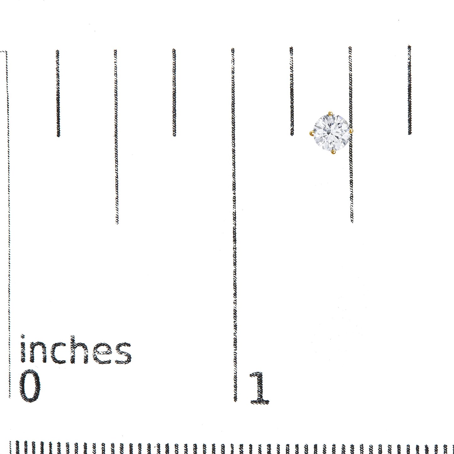 Yellow metal stud earring with a round white gemstone in a four-prong setting, shown on a ruler for size reference, front angle.