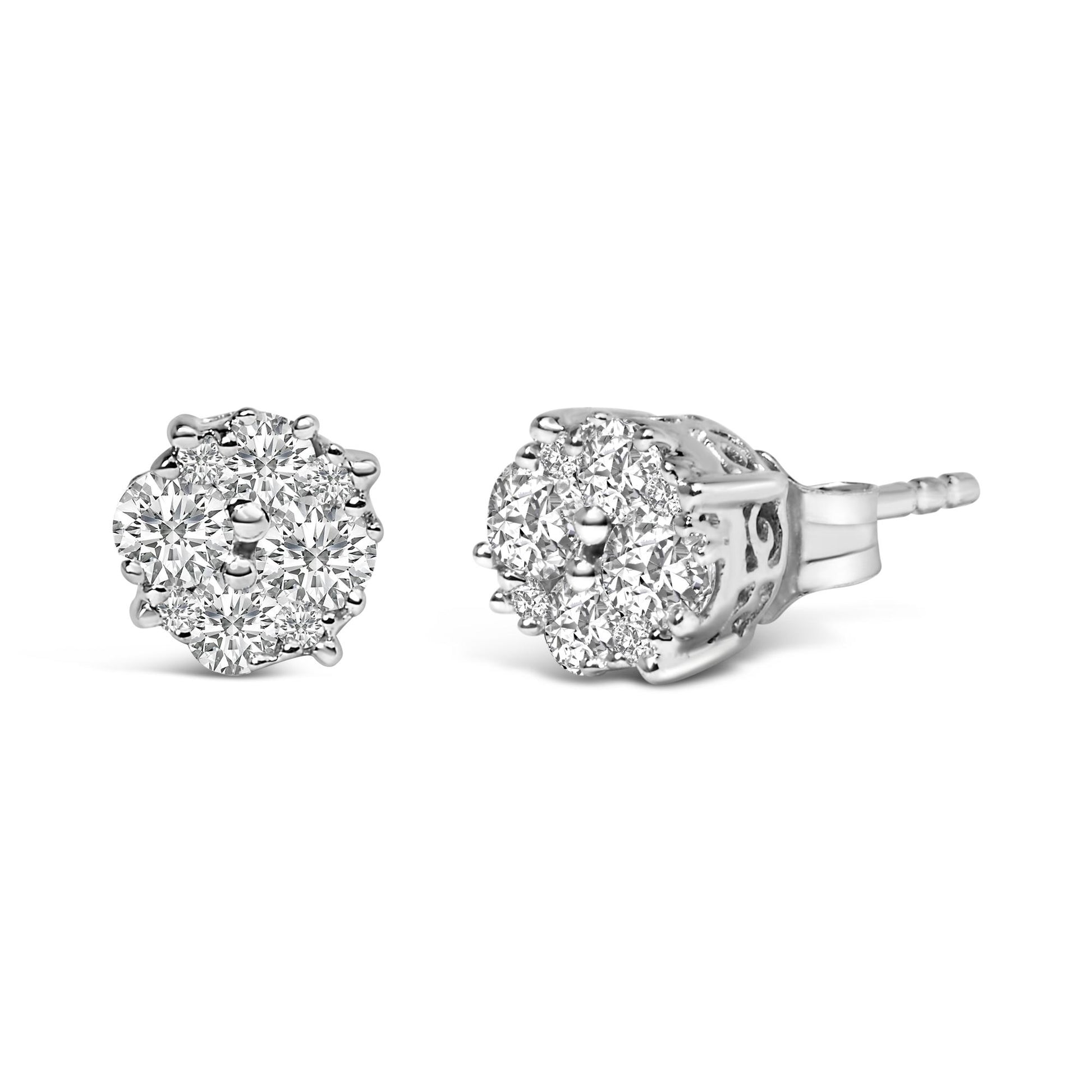 Pair of white metal stud earrings with round white gemstones in prong settings, shown from front and side angles.