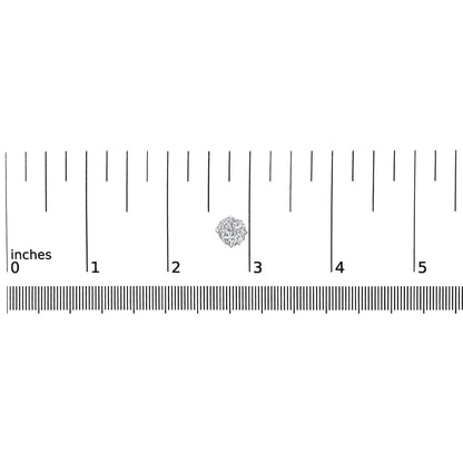 Close-up top view of a white metal round cluster earring with multiple white gemstones in prong settings placed on a ruler for size reference.