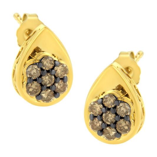 Front angle view of yellow metal teardrop-shaped earrings with cluster of round champagne-colored gemstones in prong settings.