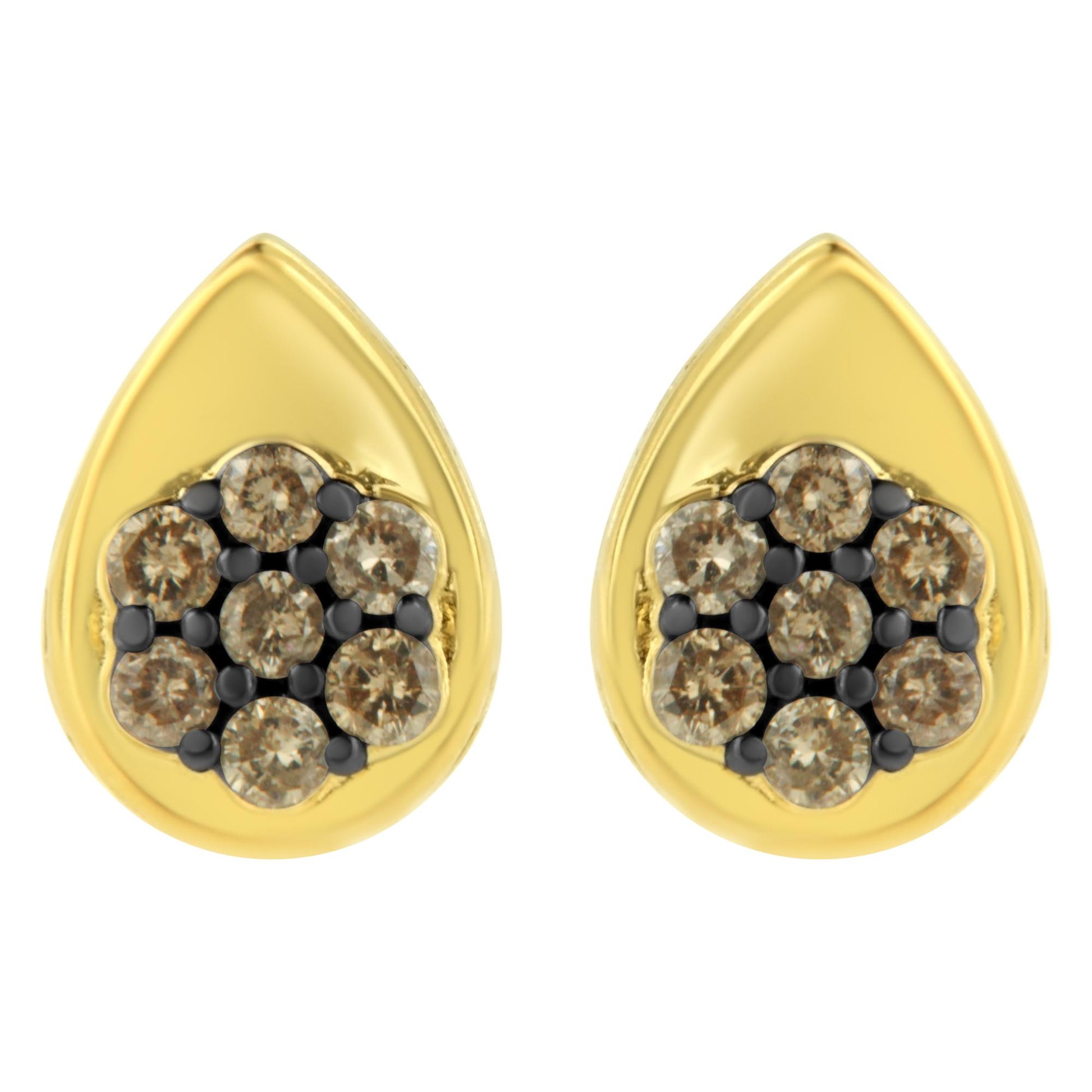 Front view of yellow metal teardrop-shaped earrings with clusters of round champagne-colored gemstones in prong settings.