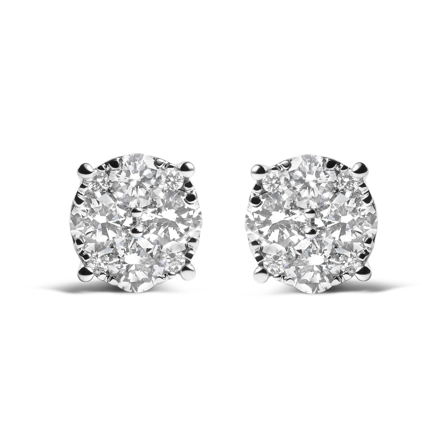 Front view of pair of round cluster stud earrings with white metal and multiple white gemstones in prong settings.