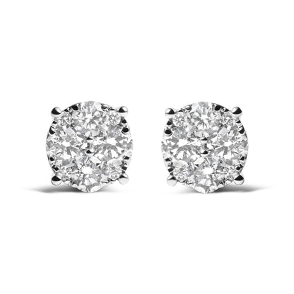 Front view of pair of round cluster stud earrings with white metal and multiple white gemstones in prong settings.
