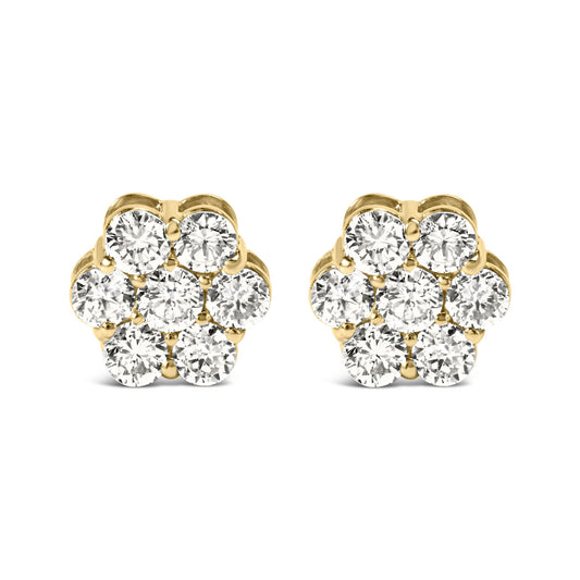 Front angle view of round white gemstone cluster earrings set in yellow metal.