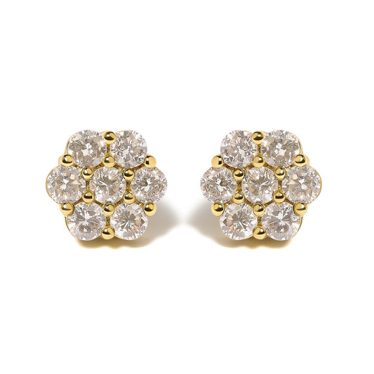 Pair of yellow metal earrings with round white gemstones in a shared prong setting, shown from a front angle on a white background.