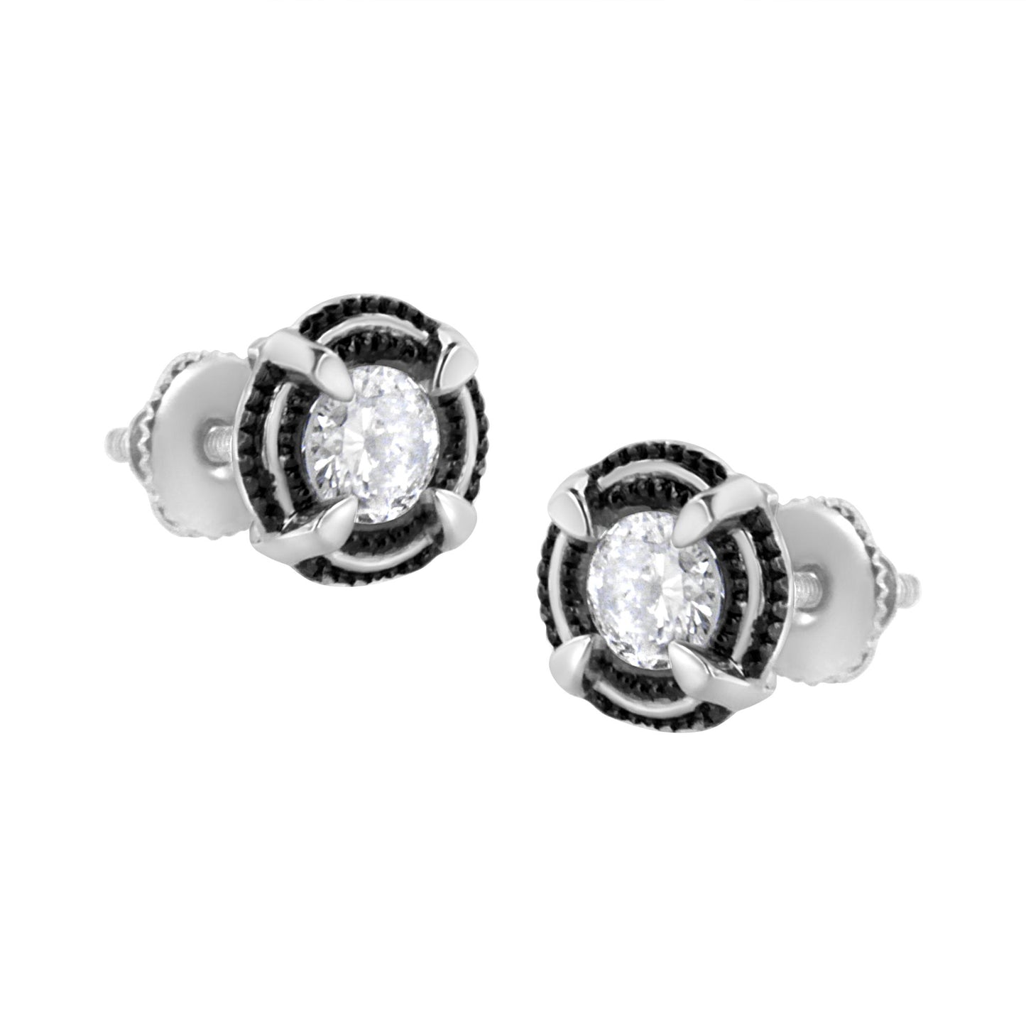 Pair of white metal stud earrings with round white gemstones in prong settings, shown from a front angle.