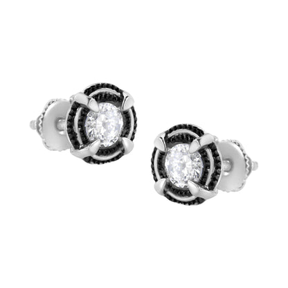 Pair of white metal stud earrings with round white gemstones in prong settings, shown from a front angle.