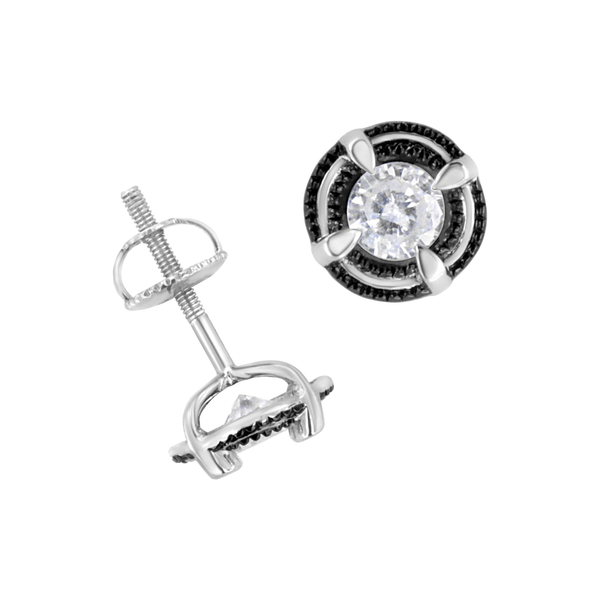 Close-up front and side view of a pair of white metal stud earrings with round white gemstones in prong settings.