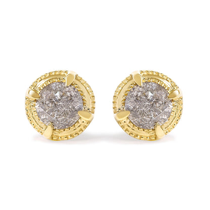 Front angle view of a pair of yellow metal stud earrings each featuring a round brownish gemstone in a prong setting.