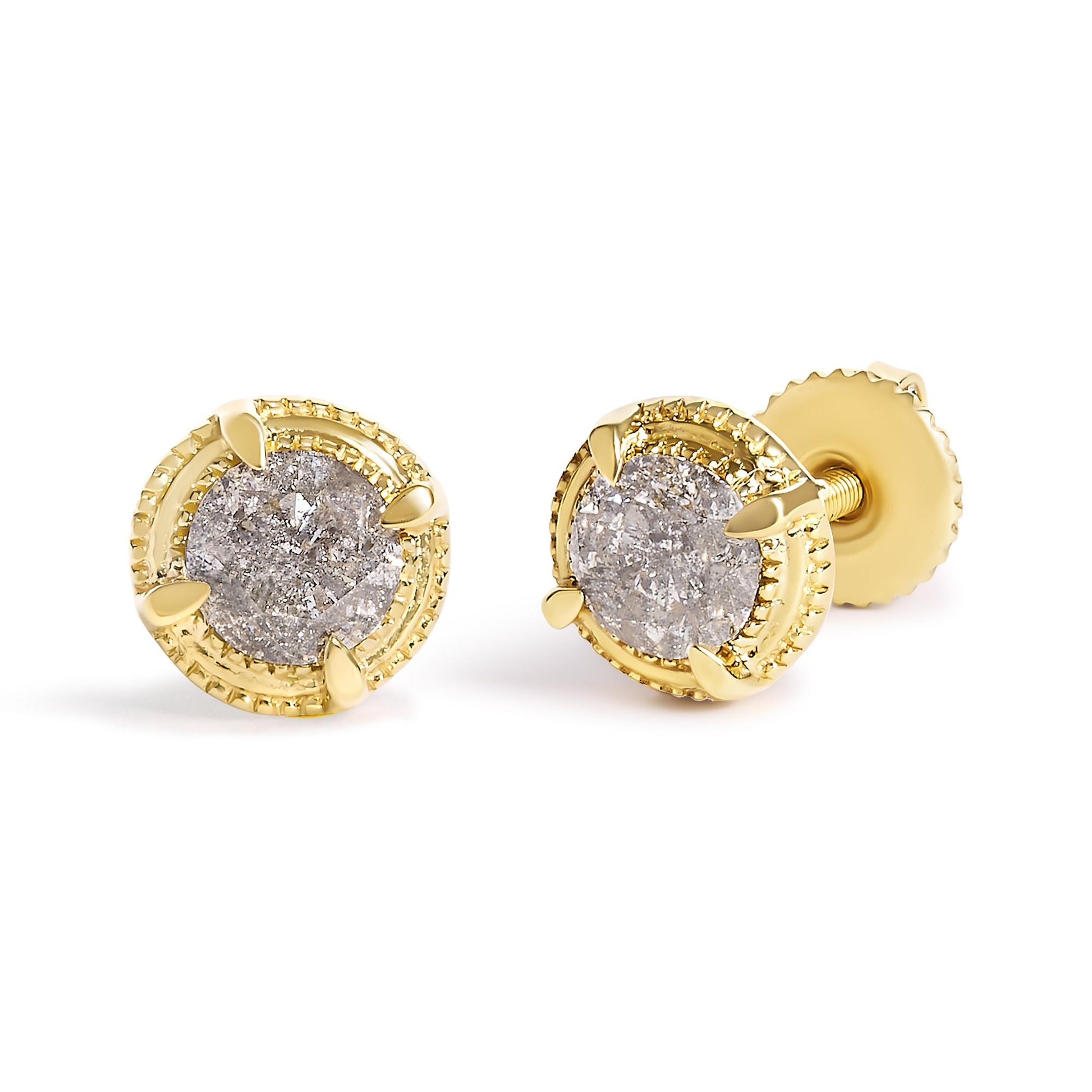 Close-up front and side view of a pair of yellow metal stud earrings with round brownish gemstones in prong settings.