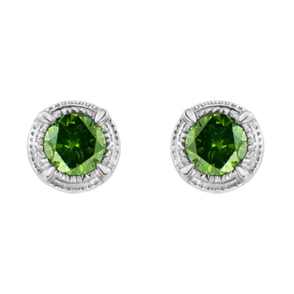 Front view of white metal stud earrings with round green gemstones in prong settings.