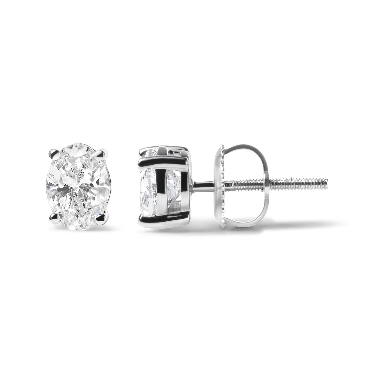Pair of white metal stud earrings with oval-shaped white gemstones in 4-prong settings, shown from front and side angles on a white background.