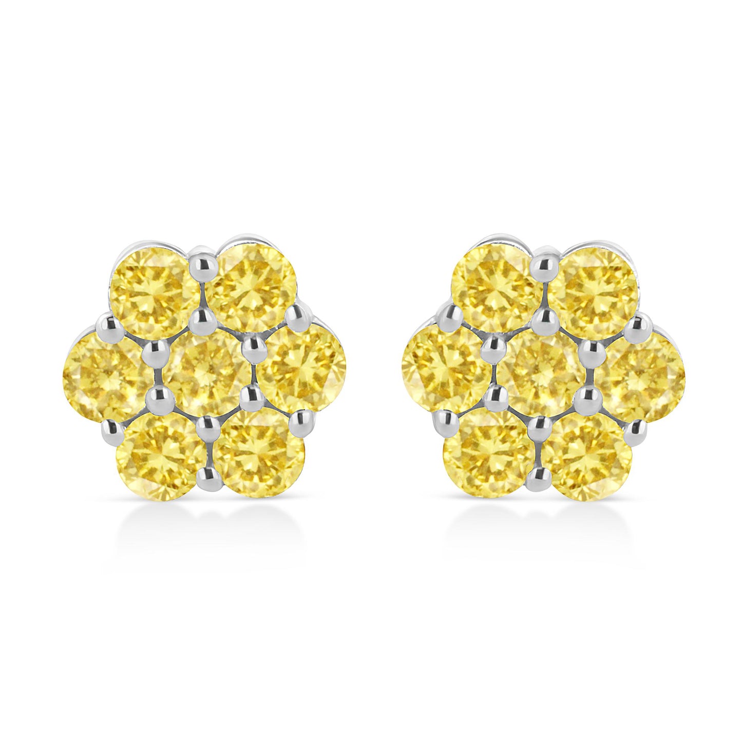 Front view of white metal cluster earrings featuring multiple round yellow gemstones in a prong setting.