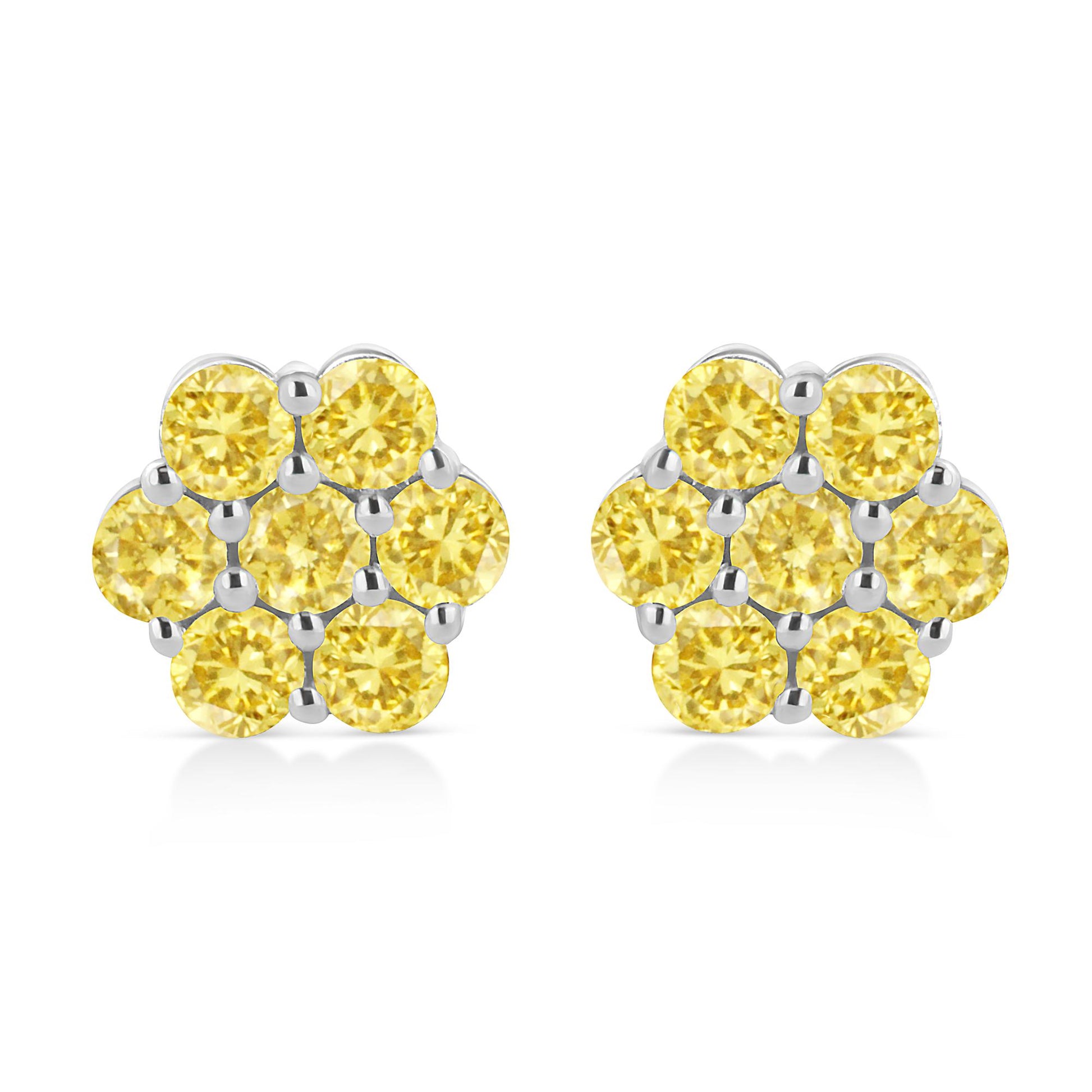 Front view of white metal cluster earrings featuring multiple round yellow gemstones in a prong setting.
